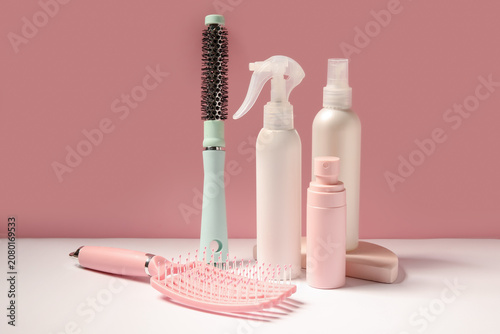 Hair sprays with brushes on...