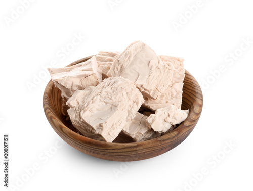 Wooden bowl with pieces of ...