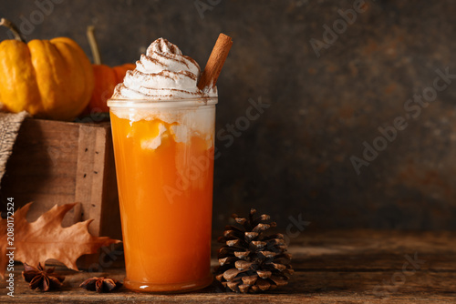 Glass of orange pumpkin spi...