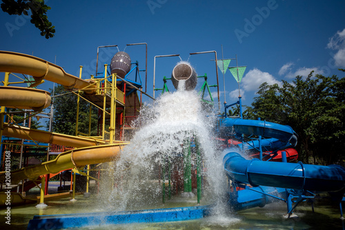 Spilled water from a huge bucket in a waterpark in Yogyakarta, Indonesia