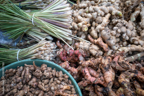 Turmeric (Curcuma longa Linn), ginger (Zingiber officinale), lemon grass (Cymbopogon citratus), cooking spices, in traditional market