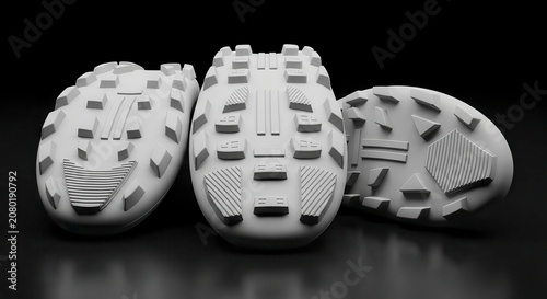 Close-up of athletic shoe soles.