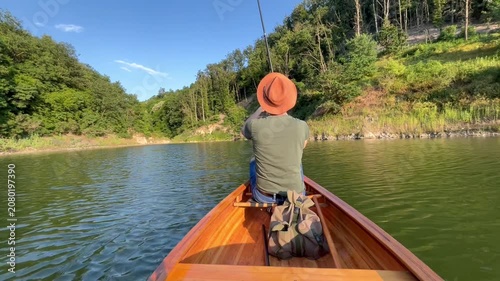 Man fishing from a canoe
