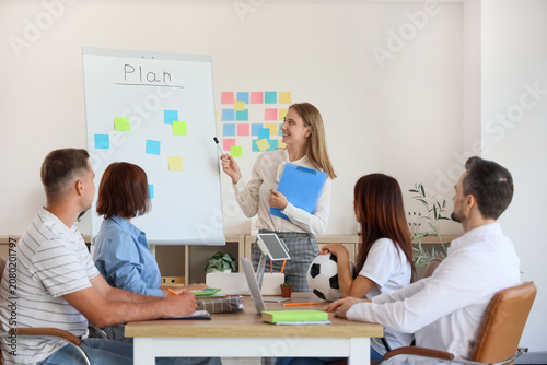 Group of teachers working w...