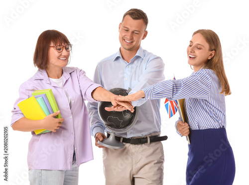 Group of teachers putting h...