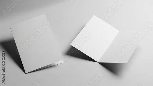 Two white blank cards on a gray background, standing upright