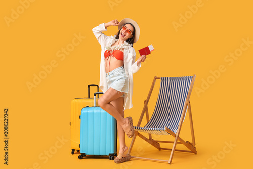 Happy young female tourist ...