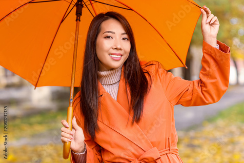 Beautiful young happy Asian...