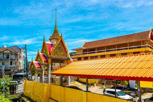 Golden Buddhist Wat Suwankeereewong Temple panorama blue sky in Thailand.
