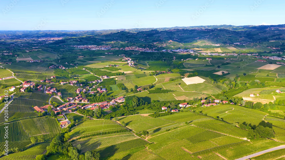 Fototapeta premium Aerial View of Rolling Green Vineyards and Rural Italian Countryside