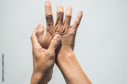 Obraz na płótnie Hands of senior people on white background. Health care concept.