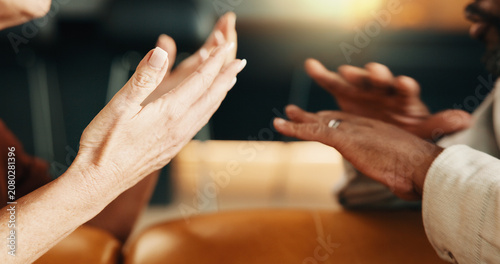 Foto Argument, conflict and hands of couple on sofa in home living room for discussion or frustration