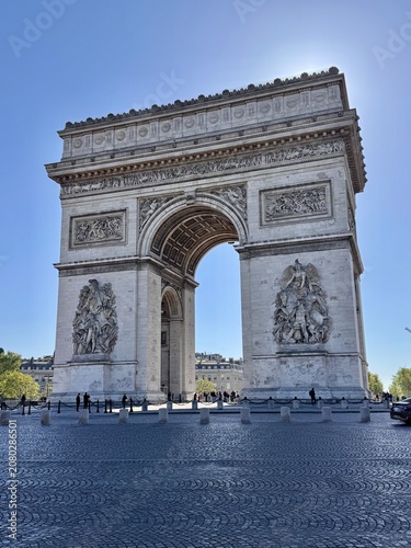 Obraz na plátně Arc de Triomphe in Paris stands majestically at the center of Place Charles de G