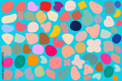  an assortment of irregular, colorful shapes against a bright blue background. 