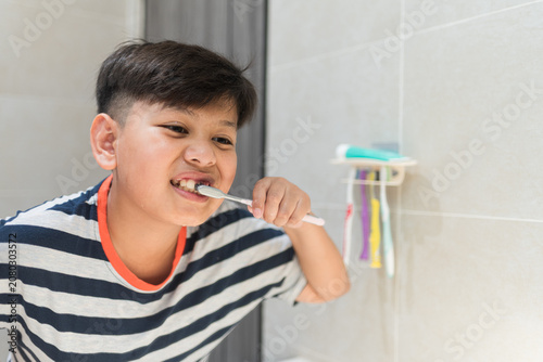 Obraz na plátne Pediatric dental care concept demonstrating juvenile morning hygiene routine and