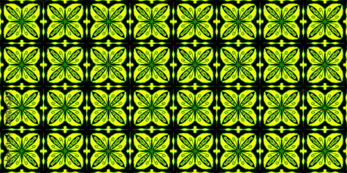 Tableau sur toile A detailed, symmetrical seamless pattern featuring intricate floral tiles in glowing shades of neon lime green and yellow set against a solid black background