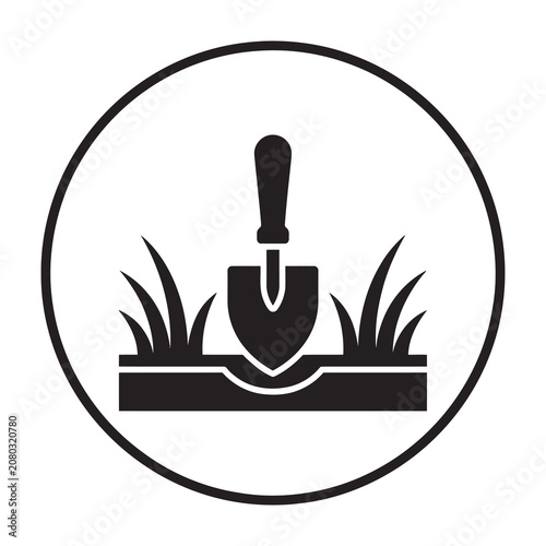 Gardening shovel icon with grass