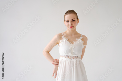 Foto Young Woman in a White Lace Camisole Feminine Fashion Portrait