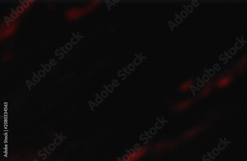 Red light streaks on dark background