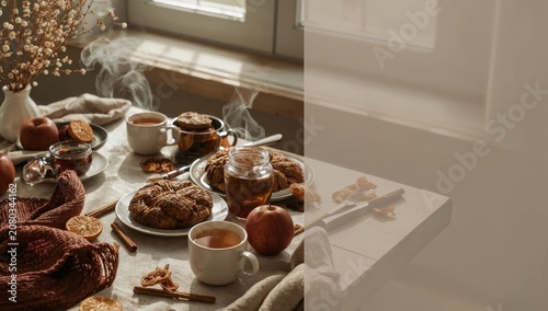Table Set With Snacks and Drinks in a Cozy Room With Sunlight in the Morning