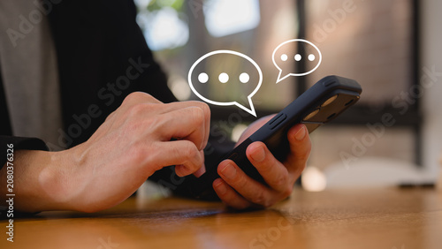 social online concept, man using smartphone chatting sending and reading text messages from internet network technology platform, social distancing, shopping, communication online