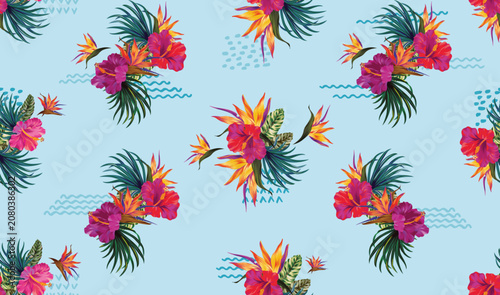 Vibrant Tropical Hibiscus And Bird Of Paradise Seamless Floral Pattern On Light Blue Background