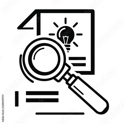 Magnifying glass on document with lightbulb idea