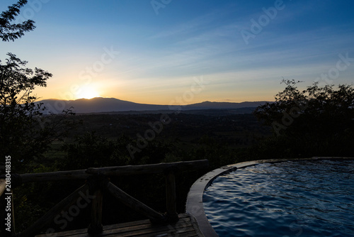 Karatu, Tanzania - 23 June 2026 - Hotel Pool at Sunset