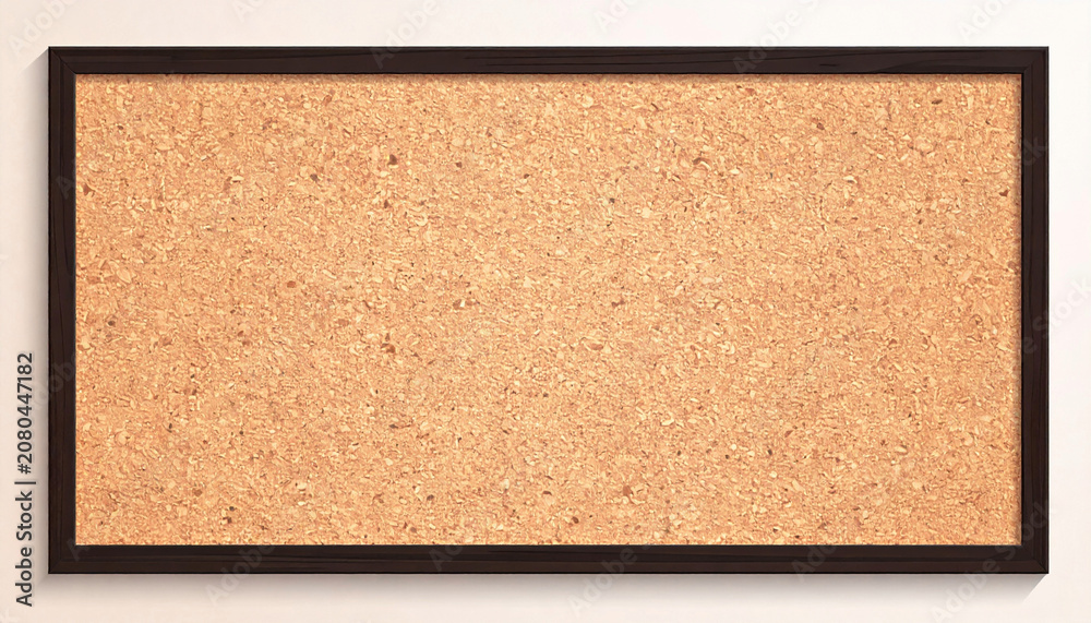 Fototapeta premium Rectangular cork bulletin board framed in dark wood, isolated on white background, perfect for pinning notes, memos, reminders, or creative displays in an office or home.