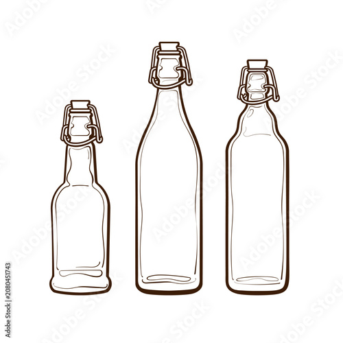 Konstfotografi Set of swing top clear glass fermentation bottles.