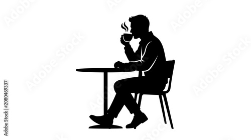 Bild auf Leinwand Silhouette of man drinking coffee at a table