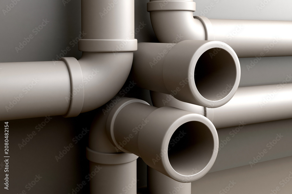 Fototapeta premium Light-colored pipes in an industrial space