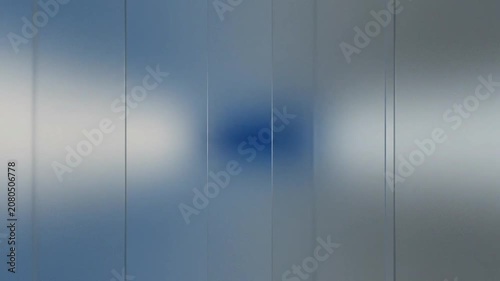 Animated abstract background with soft blue and gray vertical gradients moving subtly
