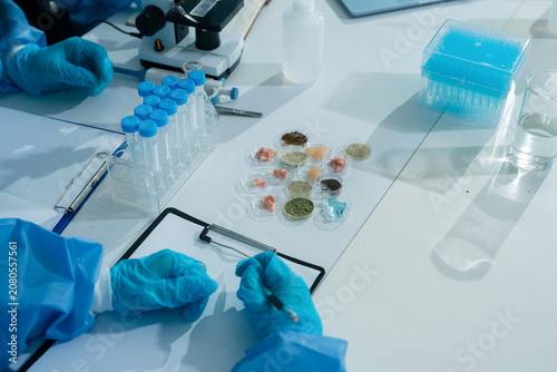 Fotografía Lab work, scientists concentration of chemical residues a test tube in analysis for vaccine development