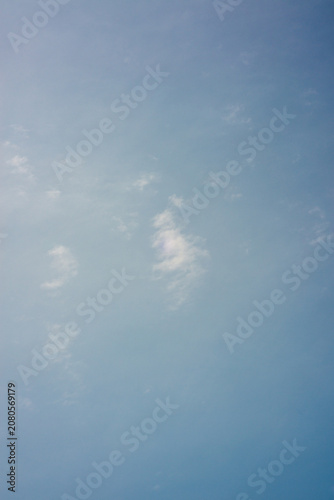 Soft Blue Sky with Light White Clouds Natural Background