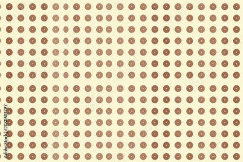 A pattern of donuts on a yellow background