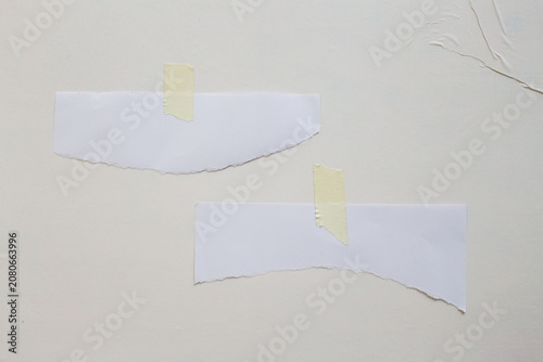 Part of a torn paper on a white background