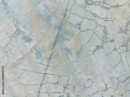 Photos Close-up of a cement wall with subtle random hairline cracks