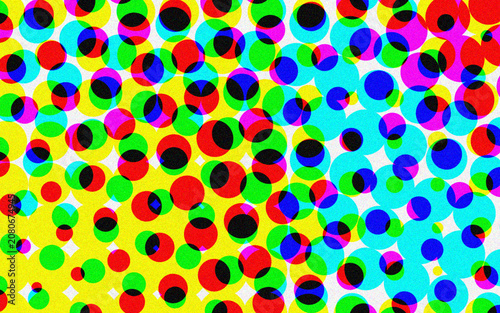 Vibrant halftone circle pattern with overlapping CMYK colors creating dynamic abstract design on bright clean white background area