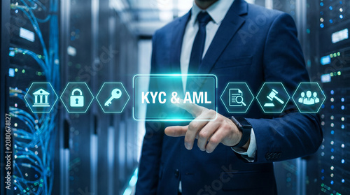 Professional businessman in a suit interacting with digital kyc and aml virtual icons for security