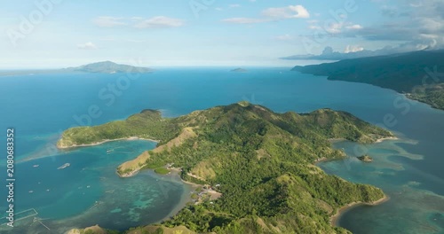 Beautiful sea landscape with turquoise water. Blue sky and clouds. Mati, Davao Oriental. Philippines.