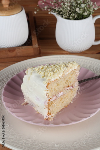 Slice of strawberry cake served on a plate