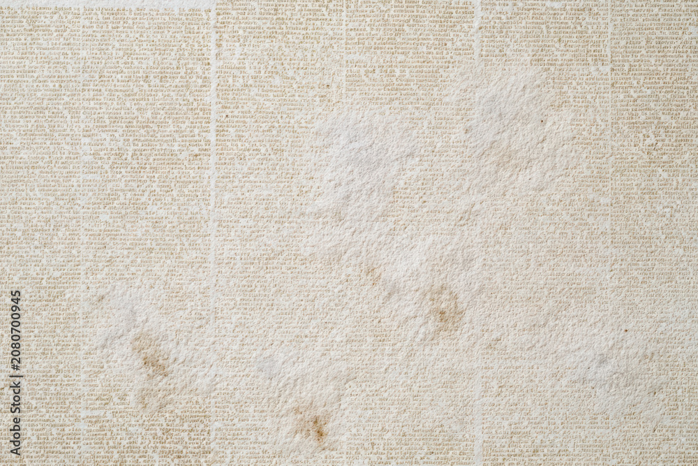 Fototapeta premium Antique Newspaper Texture: Aged Yellowed Page with Tiny Text, Wear Marks, and Soft Matte Finish for Vintage Designs