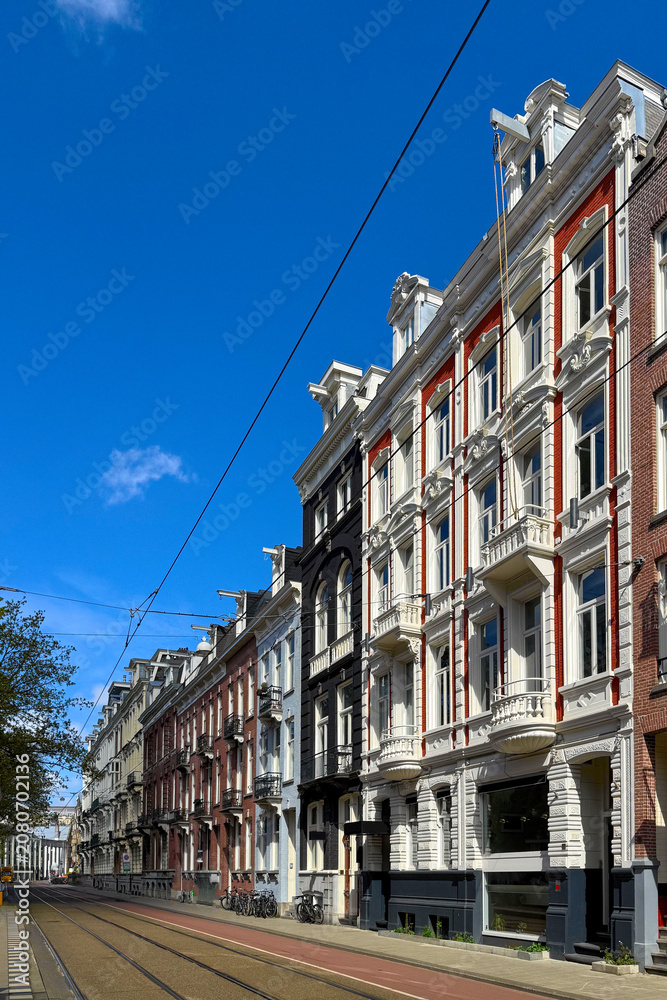 Fototapeta premium Historic street in Amsterdam the Netherlands
