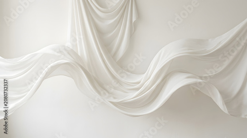 Elegant flowing white fabric drapes and folds abstractly