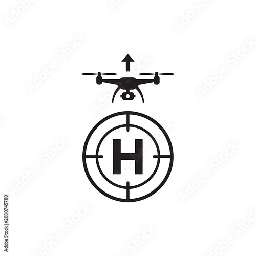Helicopter hovering above hydrogen atom symbol.