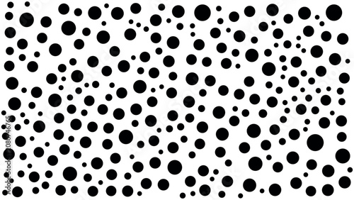 Abstract background pattern with randomly scattered black circles on white