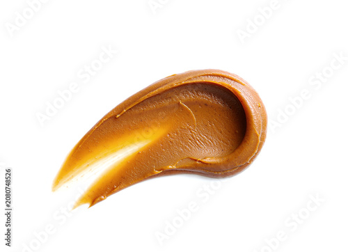 Tasty peanut butter on white background