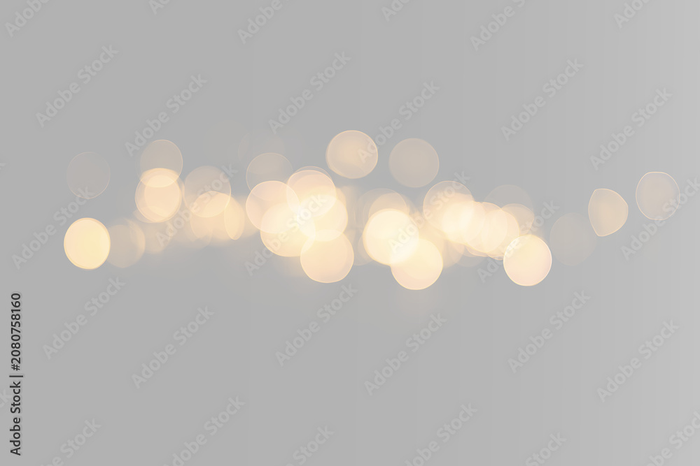 Obraz premium Luxury golden fairy lights with glowing bokeh circles, festive shimmer, glitter sparkle and dreamy light effect png