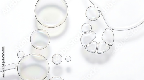 Glasses Magnifying Water Drops Set with Chrome Outlines on Clean White Background for Skincare and Testing Concept